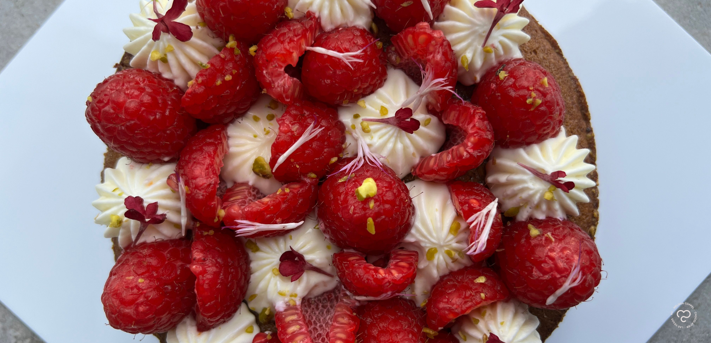 Raspberry and Pistachio Financier Tart by Gilbert Peña