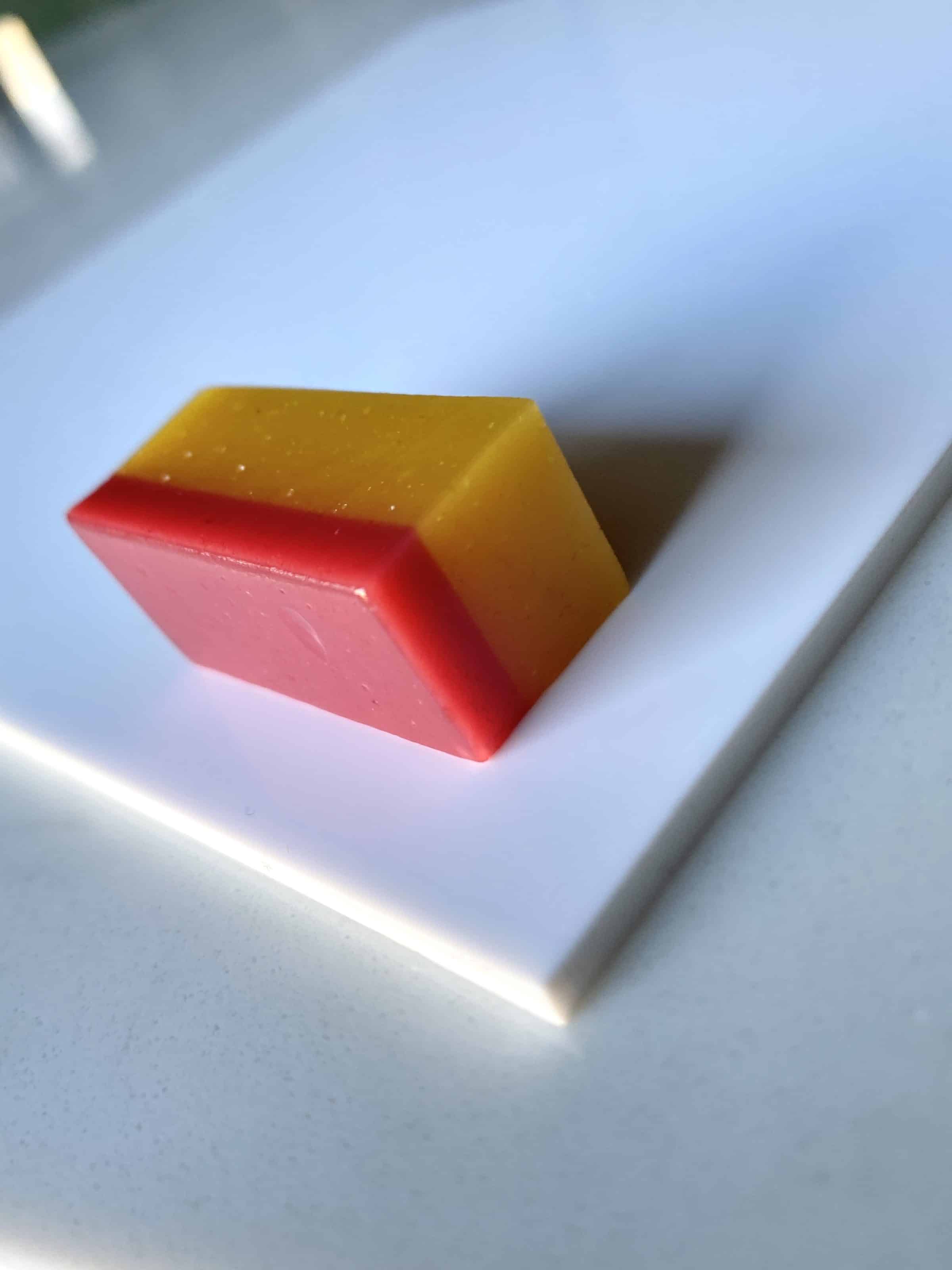 Two-layer raspberry and tropical fruit caramel