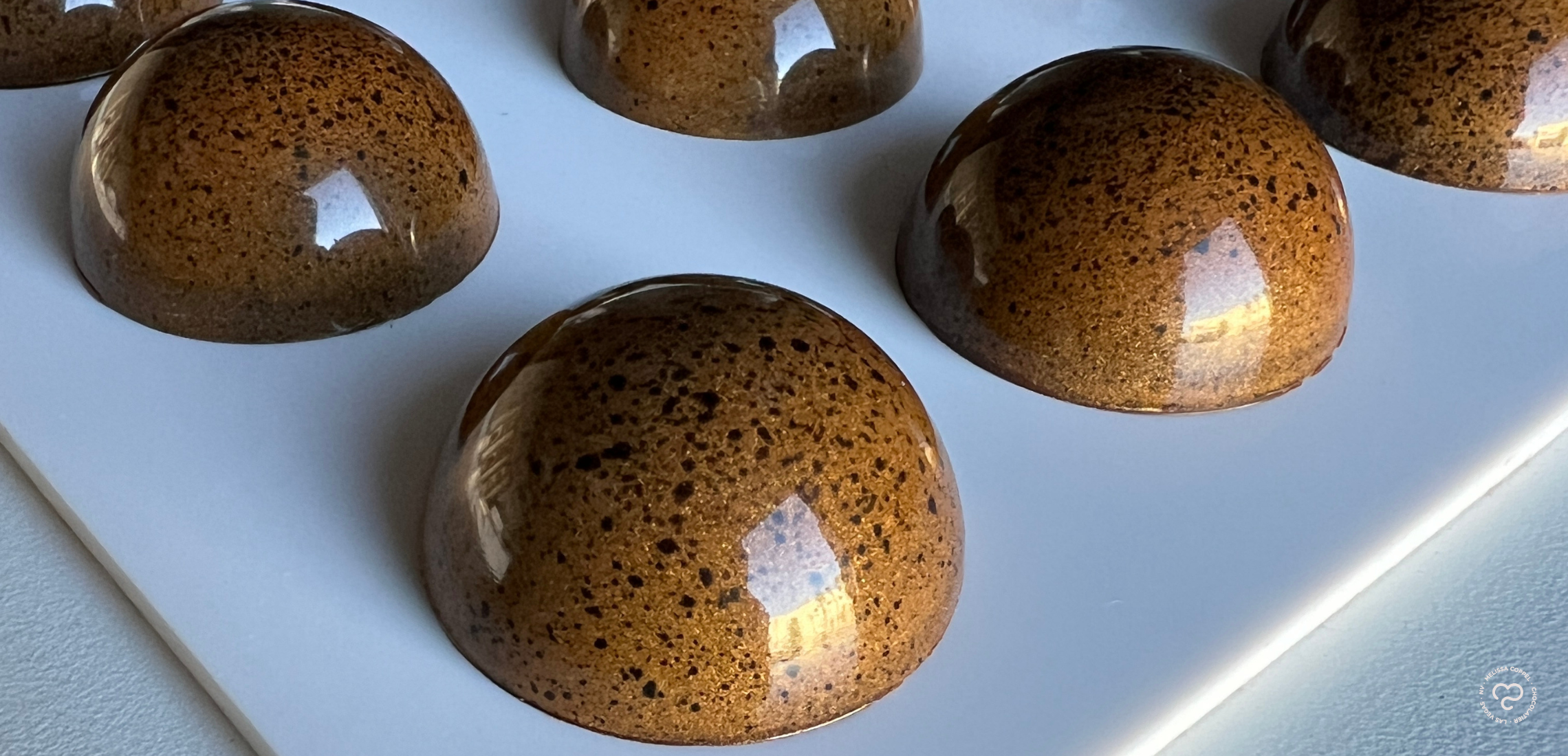 Whisky & Pecan Molded Bonbons by Ramon Perez